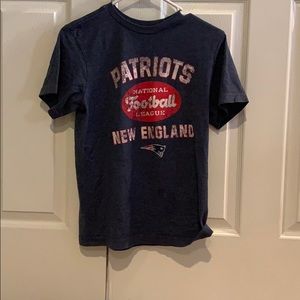 A New England Patriots teeshirt.